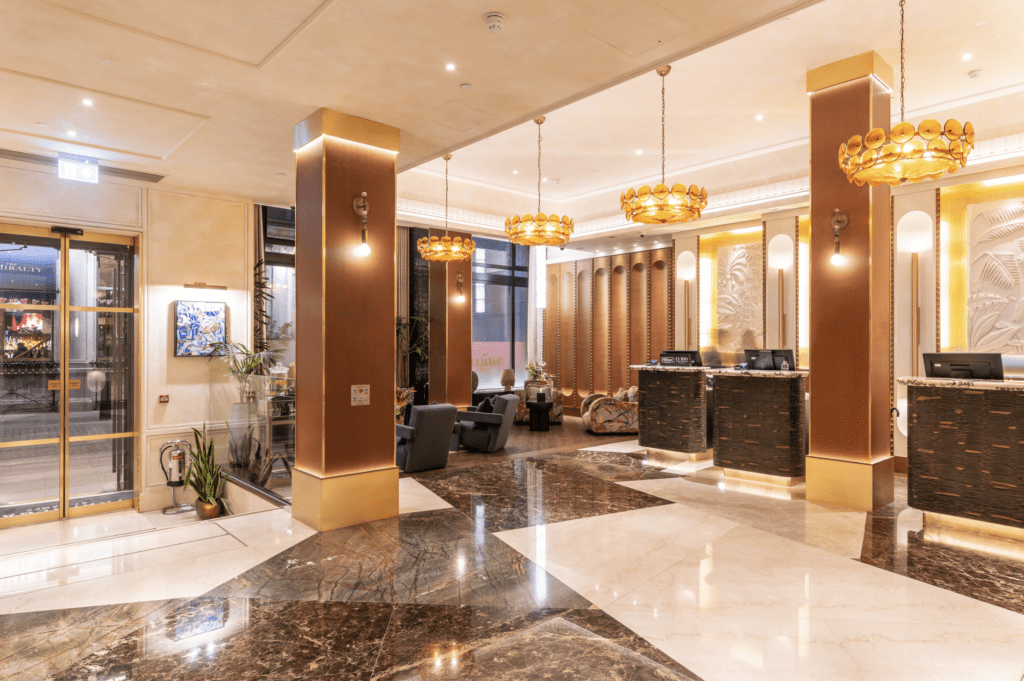 a lobby with marble flooring and a marble floor
